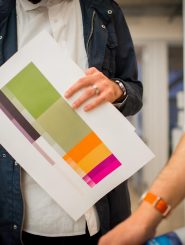 designer-critique-with-printout-on-the-desk-in-the-W6BF2YE